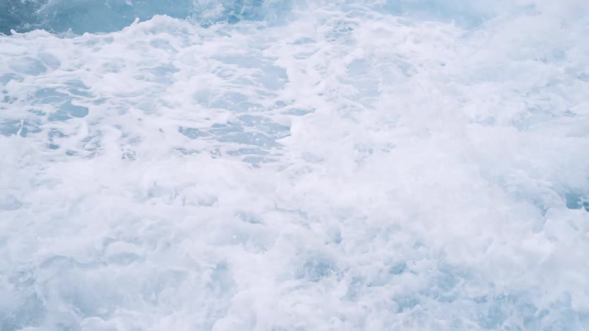 Close up view of ocean waves moving fast