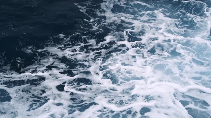 Slow motion view of ocean waves moving