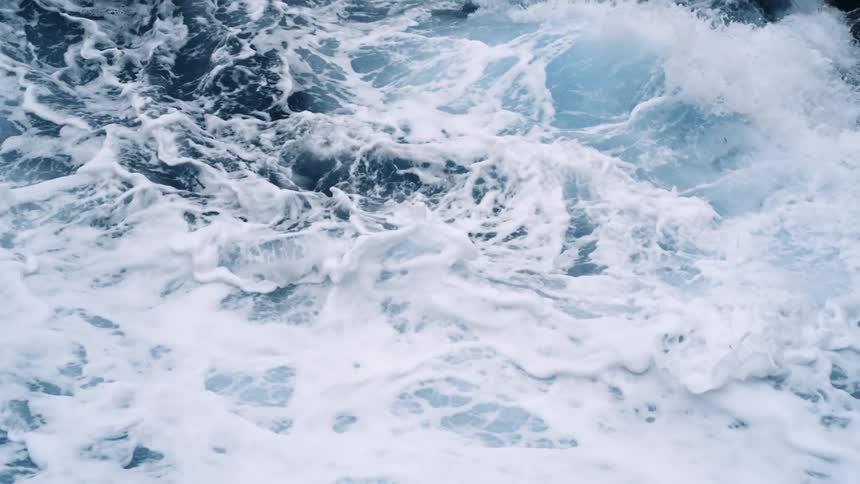 Close up view of ocean waves crashing together