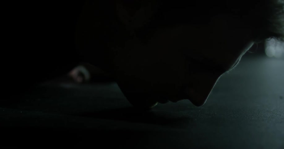 A man does push ups slowly