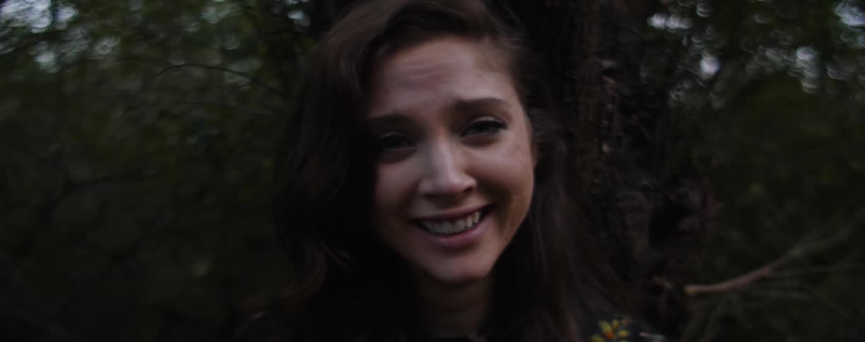Close up of woman smiling and talking