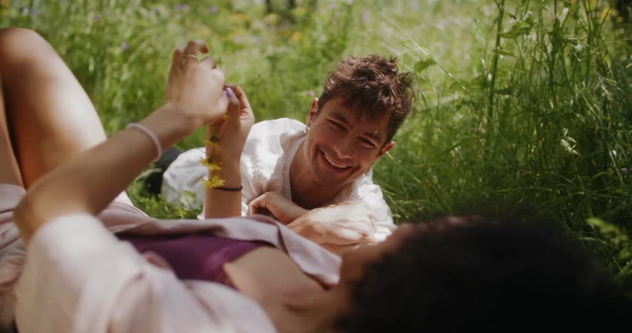 The view is of two couples that are outdoors in the day time