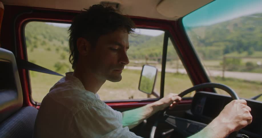 The view is of a portrait of a man that is indoors