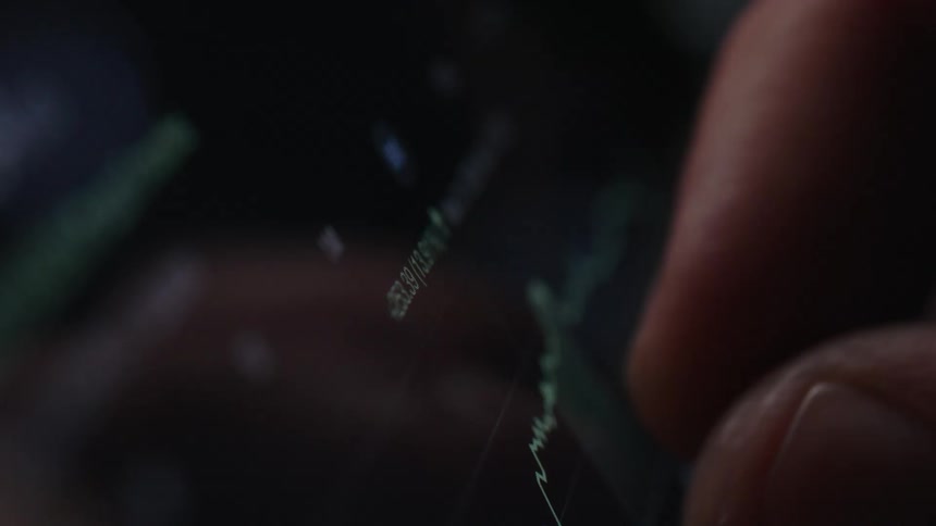 A person is checking a graph on their phone