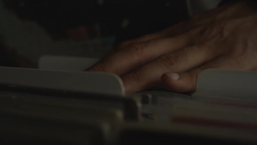 A person is searching through folders