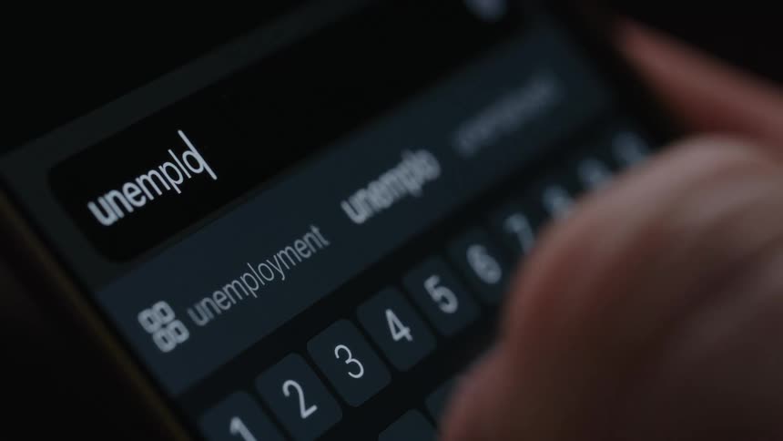 Person typing on a smartphone