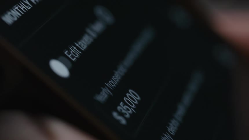 Person scrolling the screen of a portable electronic device