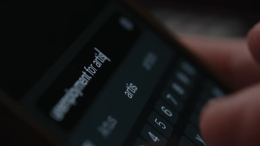 A person is searching on their cell phone