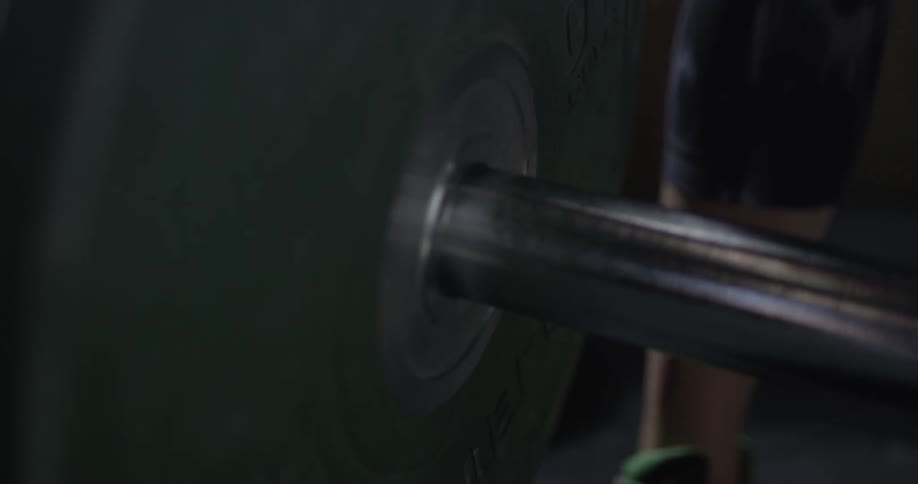 A bar is put into a weight plate