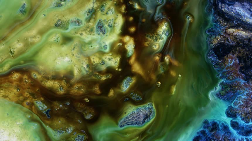 Liquid colors are flowing on solid rocks with glowing light