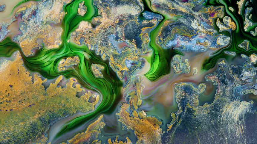 a liquid art image looks like planet earth from space