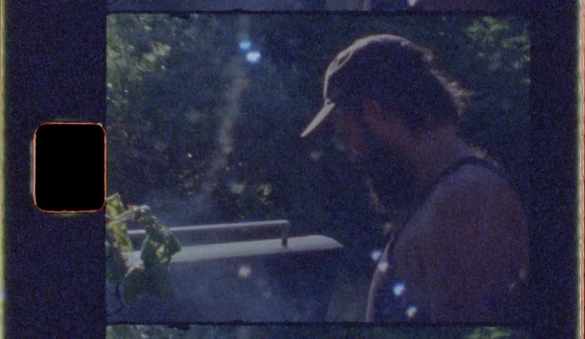 A man is grilling food outside