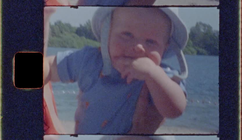 Mother and son having fun on a sunny day at the beach