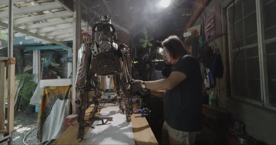 A man is working on a machine