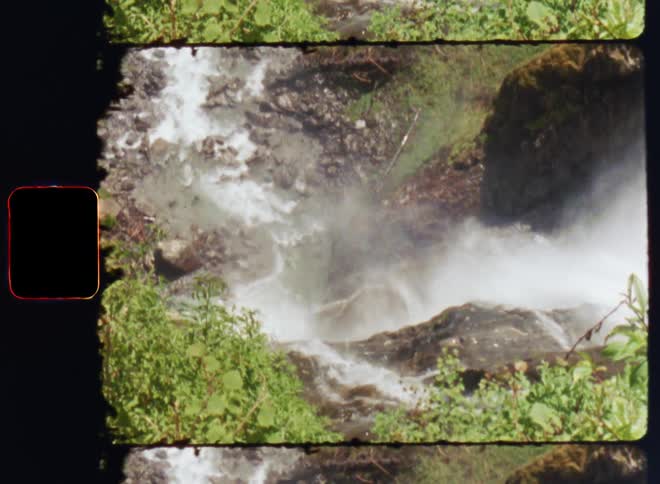 Aerial view of a landscape with waterfall in the forest