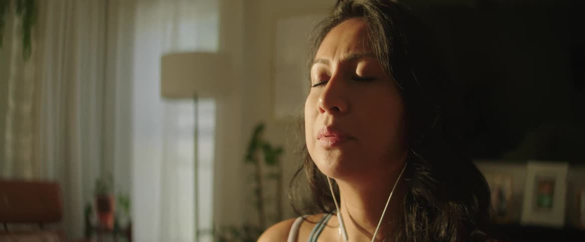 A pregnant woman is meditating