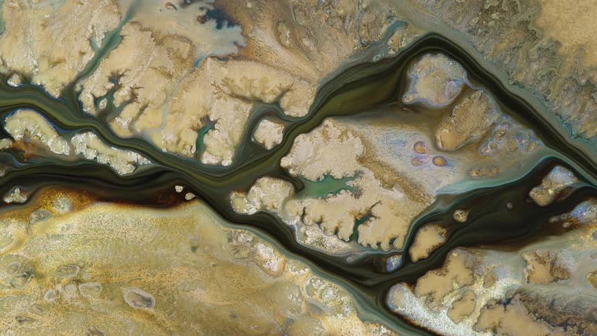 a river in the dry desert moves in this abstract satellite image