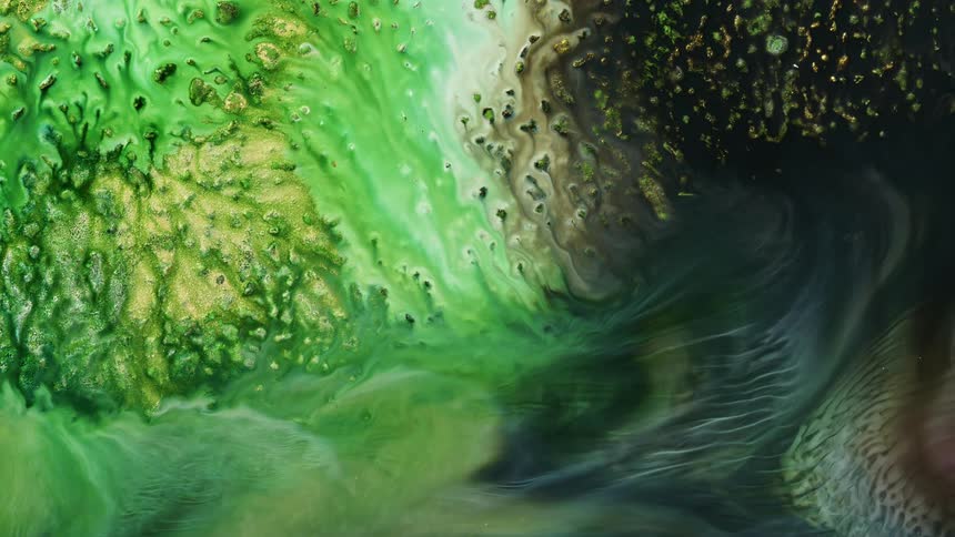 green and black rivers mix in this satellite like surreal image