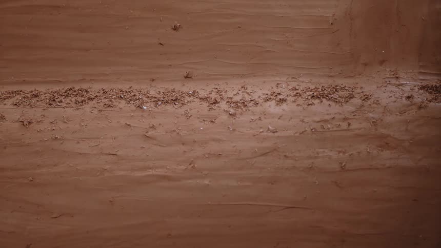 Clay shavings on molded clay model