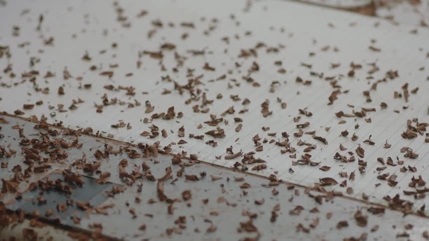 Clay shavings litter the floor
