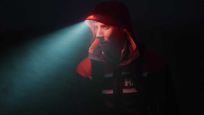 A man is searching in the dark
