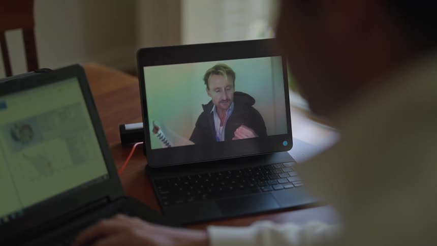 Men are talking on a video call