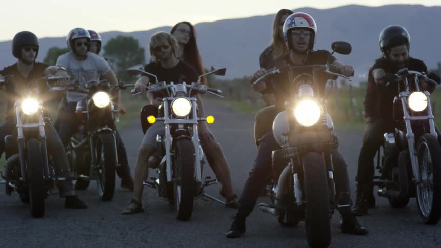 A group of people are on motorcycles