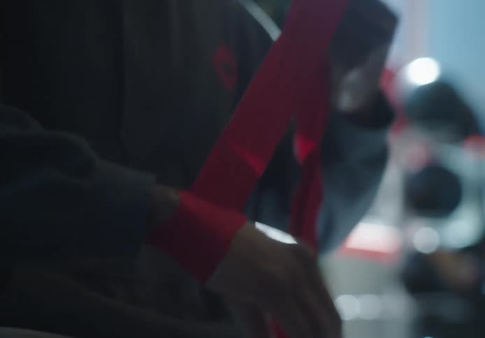 A man is taping up his hands