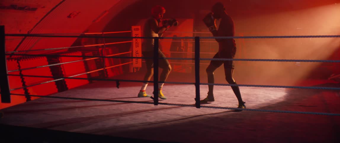Two men are boxing in the ring