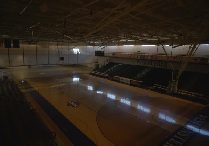 The lights shut off in the empty basketball court