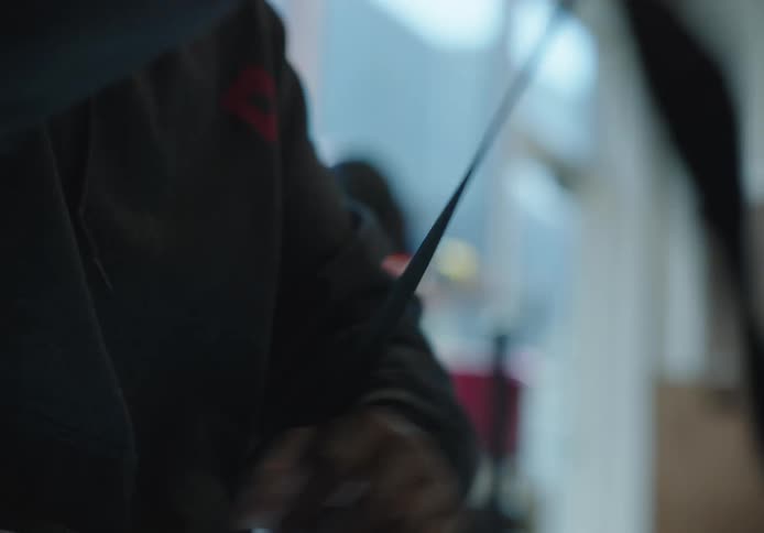 A man is taping up his hand