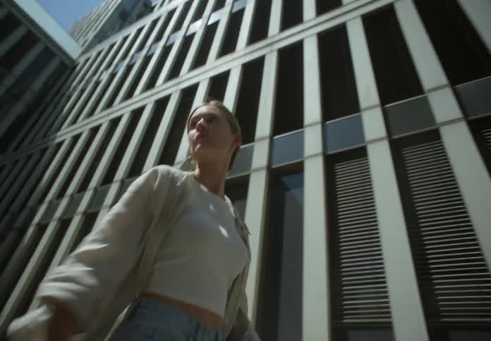 A woman is walking in the city