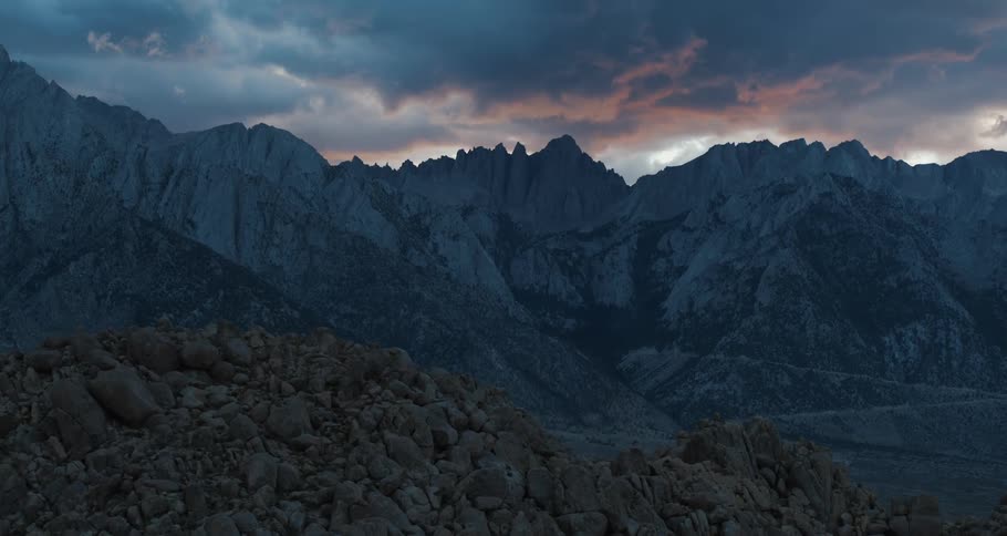 Heavy clouds brew above the eastern sierra mountains in the desert