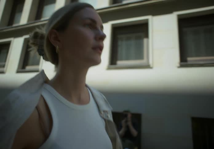 A woman is walking in the city