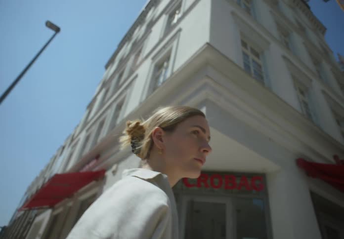 Blonde woman walking in the streets