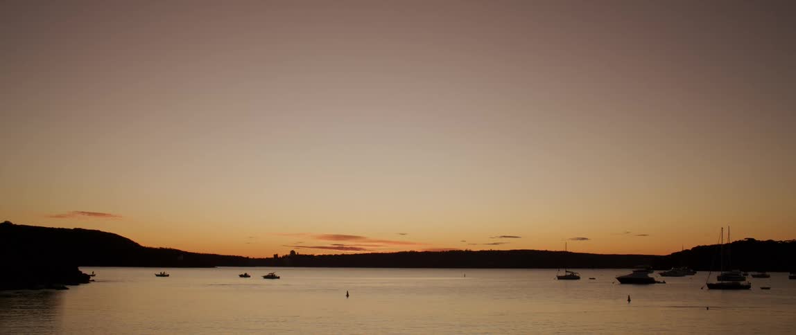 Boats are anchored in the lake