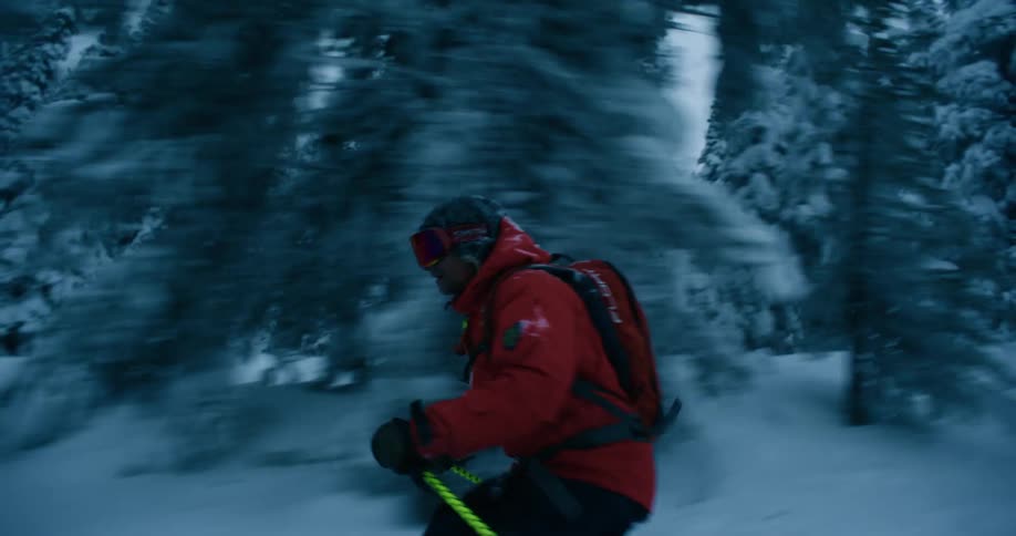 Man skiing on a snow covered slope