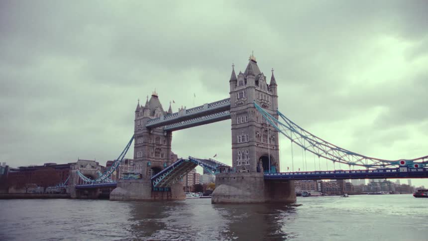 The tower bridge is opened to allow boats to pass