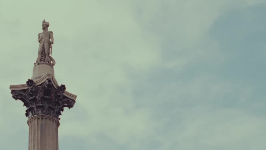 A sculpture sits atop a tall column