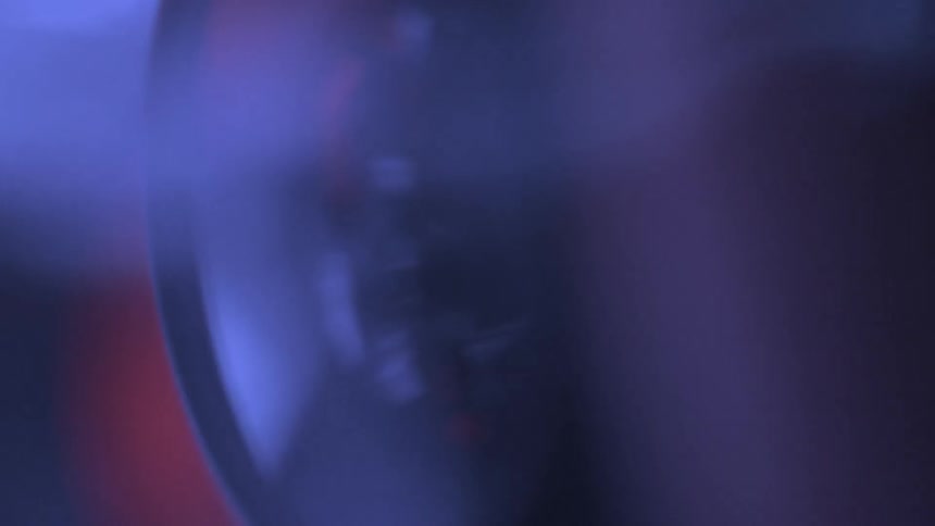 The side of an object is blurry in a dark area