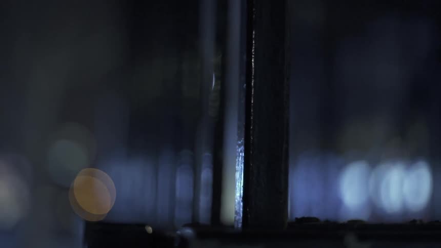 Railing of an outside platform at night