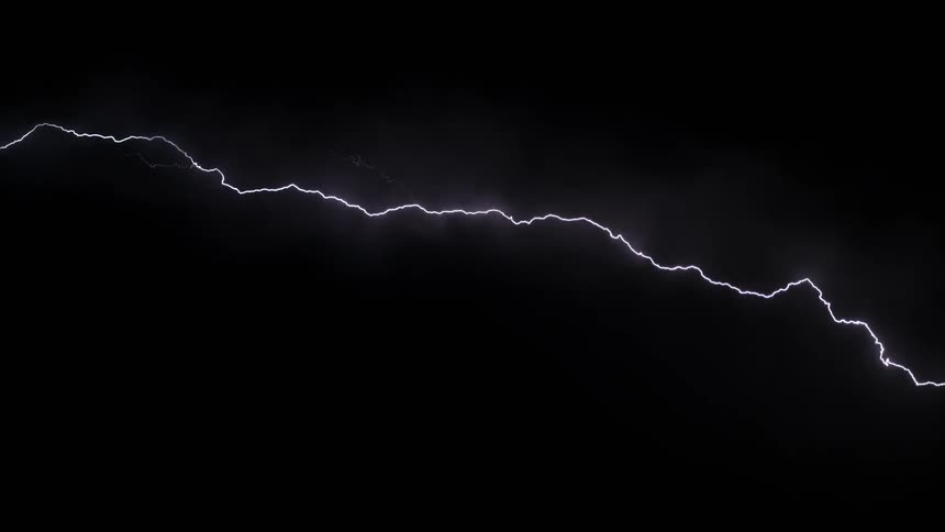 A large bolt of lightning streaks across a dark sky at nighttime