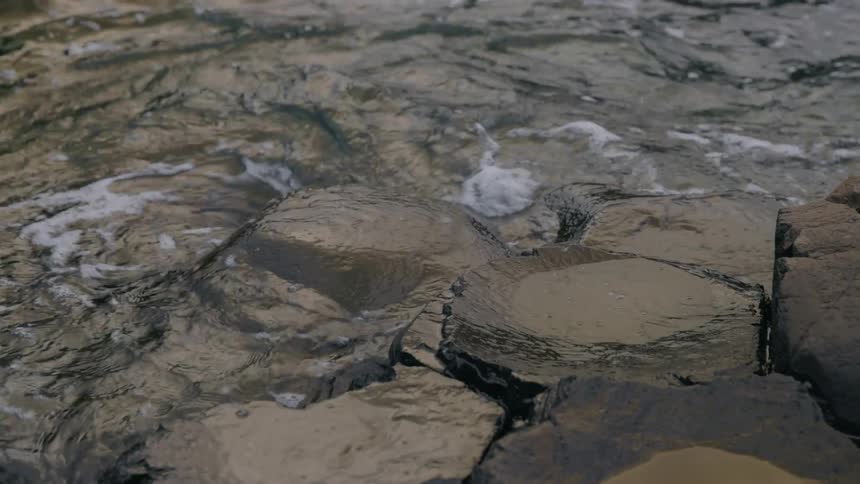 Sea waves breaking against the rocks