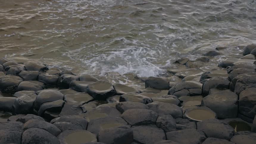 Sea waves breaking against the rocks