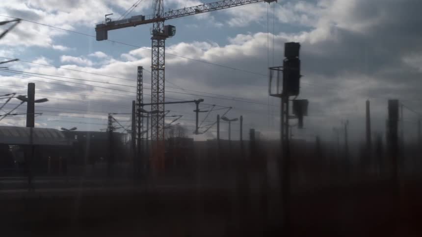 Power lines fill the area on a cloudy day