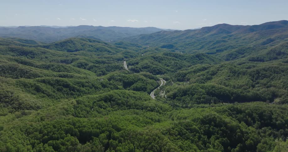 A trail runs through the mountain hills