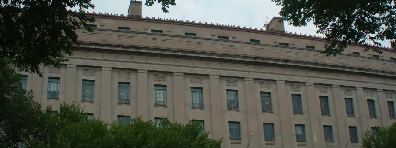 The facade of a large building during the day