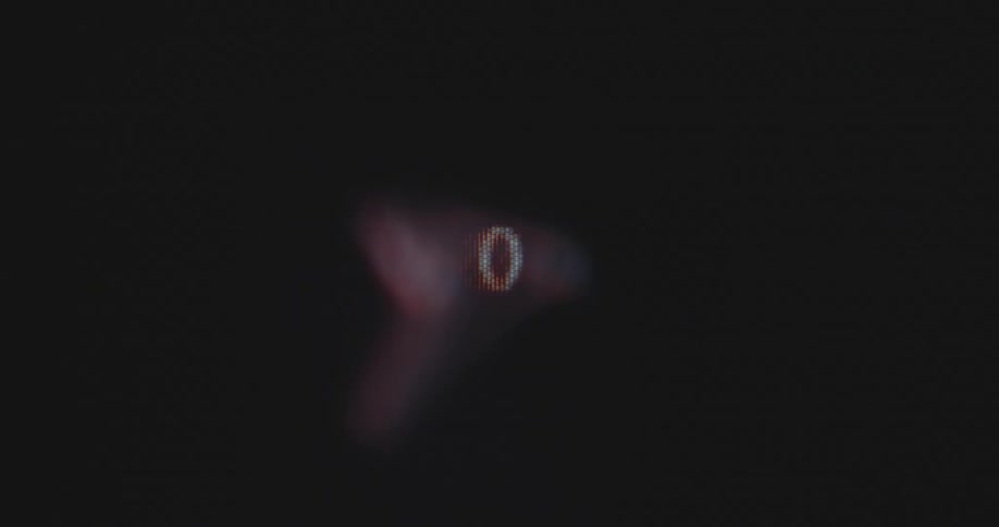 A digital display shows an encircled number or digit that increases and decreases from 0 to 100 as symbol for the completion of a charging and loading process or achievement measured in percent