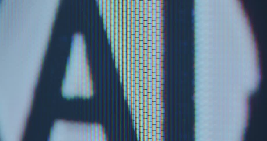 A modern and extreme macro closeup of an old computer screen that shows a dynamic image of a digital and animated Artificial Intelligence symbol that is moving and pulsating while the AI is loading and searching for results
