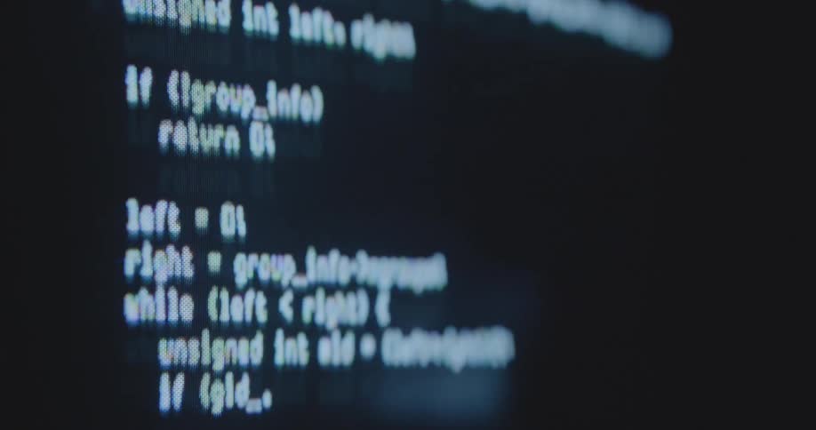 Bright white coding code in HTML programming language flashes on PC screen symbolizing the power of the modern and innovative information technology and online resources stored on servers and protected by computer programs